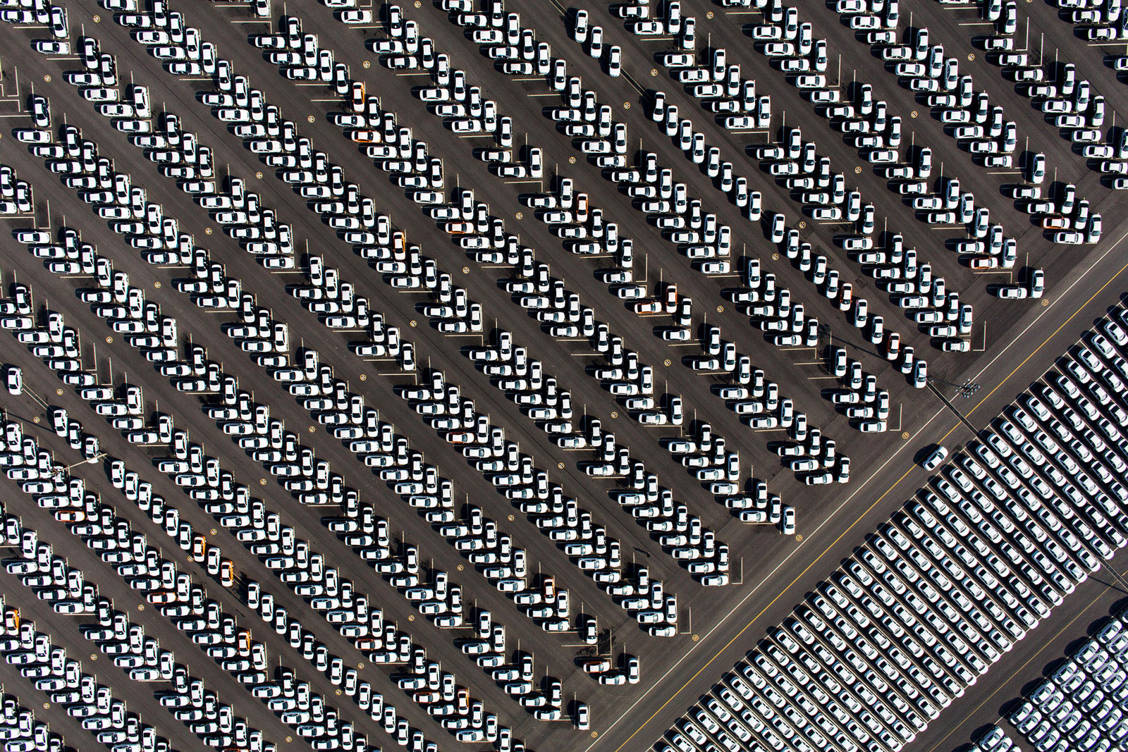 Hyundai Motor vehicles parked at a delivery center at the company's factory in this aerial photograph taken in Asan, South Korea, on Tuesday, Jan. 20, 2015.