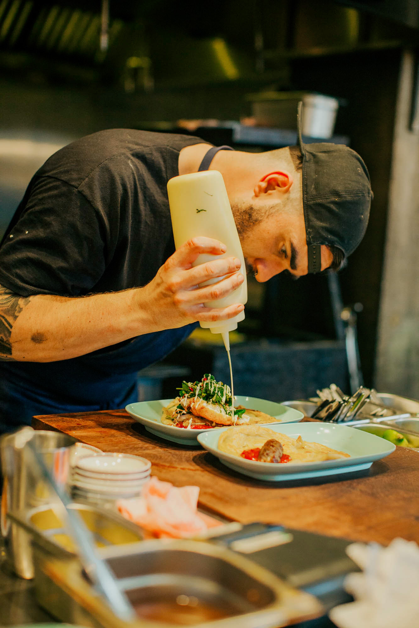 Head chef Ali Borer finishes the rotis.